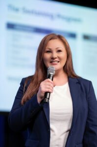 Kellie Johnson head and shoulders speaking at event 2026